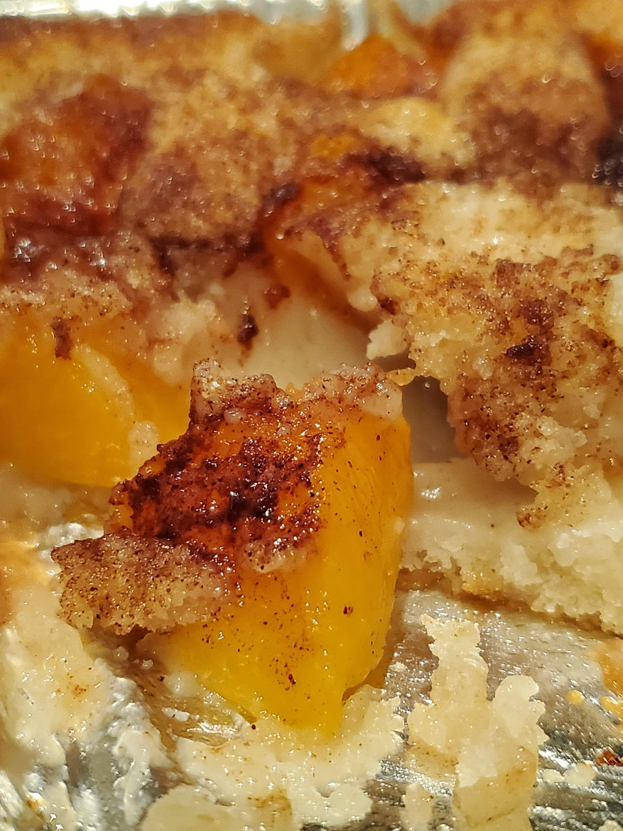 Classic peach cobbler with golden crust