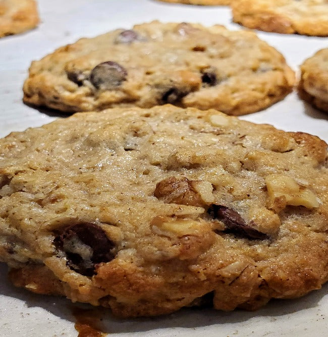 Dozen oatmeal chocolate chip walnut cookies with hearty flavor