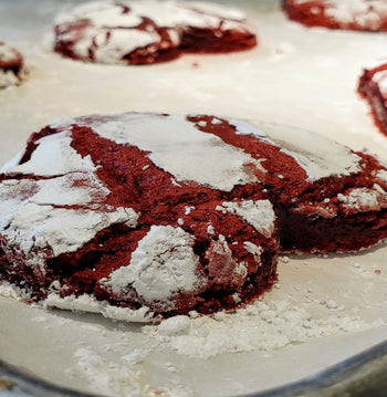 Dozen heart-shaped white velvet cupcakes